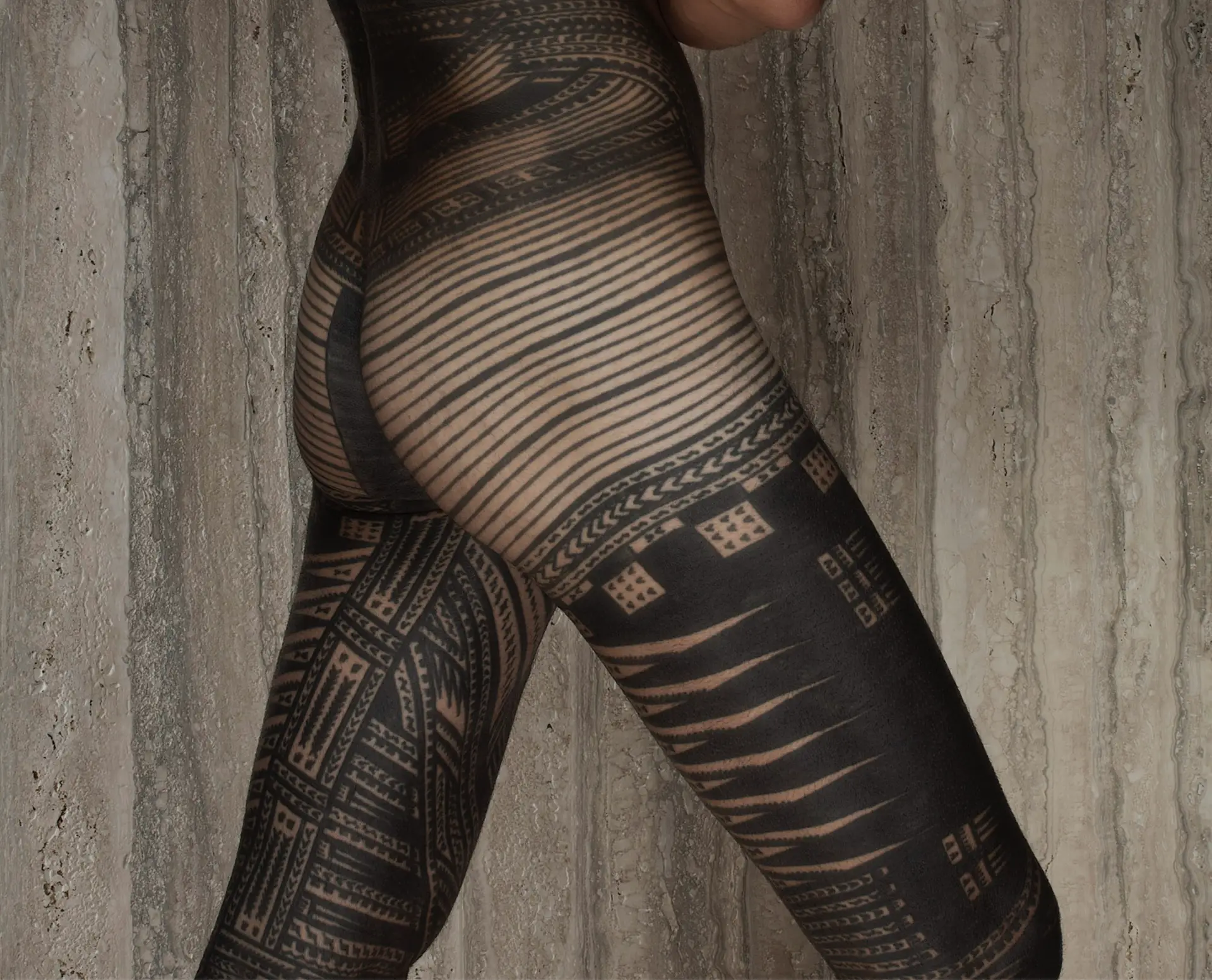 Close up of person covered in tattoos