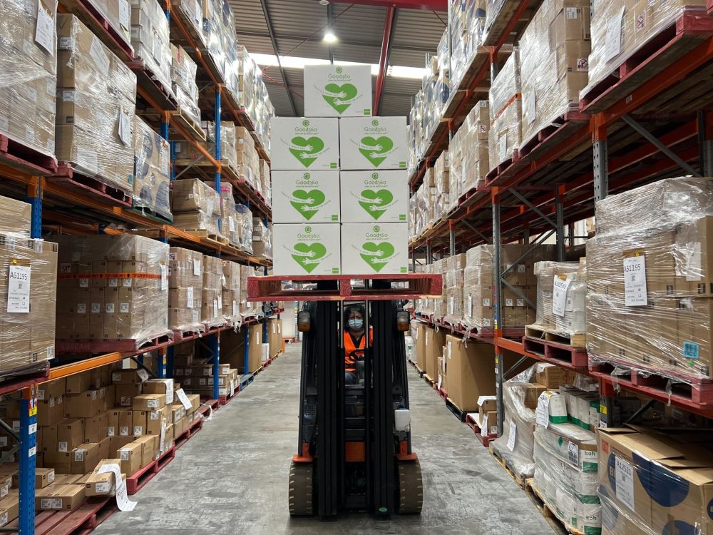 Good360 Warehouse Forklift with stacked pallet